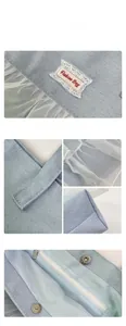 Detailed view of light blue denim tote bag with white lace trim and magnetic closure