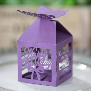 Detailed laser-cut Happy Birthday candy box in purple with elegant butterfly top closure