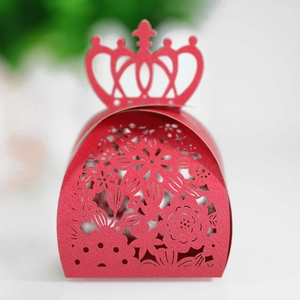 Detailed laser-cut floral pattern on a red crown gift box for weddings and parties