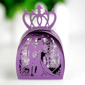 Detailed laser-cut purple wedding favor box featuring bride, groom, and crown design