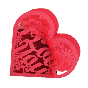 Red laser-cut heart candy box with I Love You text and elegant silk ribbon for weddings