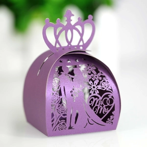 Detailed laser-cut purple wedding favor box with Mr & Mrs silhouette and crown design