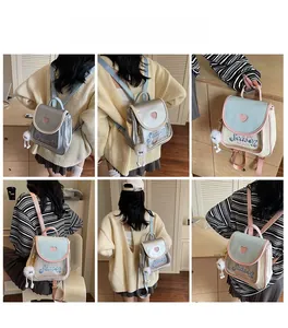 Detailed views of kawaii mini backpacks with heart-shaped cutout and plush keychain charm