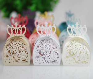 Detailed laser-cut candy boxes with crown motif in multiple pastel and vibrant colors