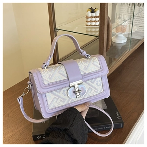 Purple small square bag with geometric embroidery and silver rotating metal lock detail