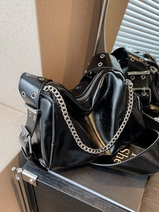 Glossy black hobo shoulder bag with silver chain and rivet strap for 2026 summer fashion