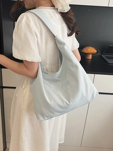 Light blue oversized hobo tote bag with MVICHI embroidery and wide shoulder strap