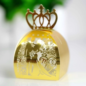 Detailed laser-cut gold wedding favor box featuring Mr & Mrs design and crown top