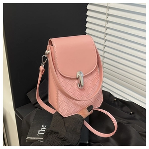 Detailed close-up of pink textured crossbody phone bag with silver metallic swivel lock
