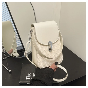 Detail of cream white mini crossbody bag with woven PU leather and silver twist lock