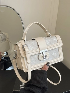 Chic beige square shoulder bag with floral jacquard fabric and silver twist lock detail