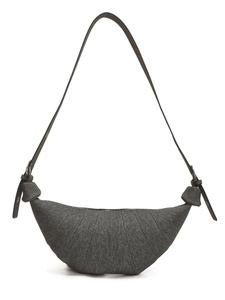 Dark grey denim croissant bag with pleated details and adjustable leather strap
