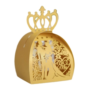 Golden laser-cut wedding favor box with crown and Mr & Mrs heart patterns