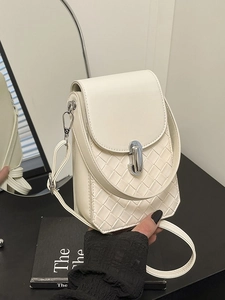 Creamy white woven small square crossbody bag with silver lock and slim shoulder strap