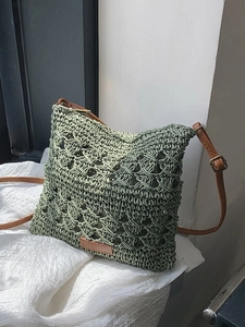 Green woven crossbody bag with brown faux leather strap for summer outdoor style