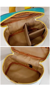 Detail view of the makeup bag interior with removable T-shaped dividers and mesh pocket