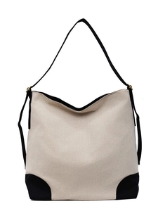 Minimalist large canvas tote bag with color-block design and adjustable black shoulder strap