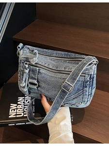 Fashionable washed denim crossbody square bag with multiple zipper pockets and wide strap
