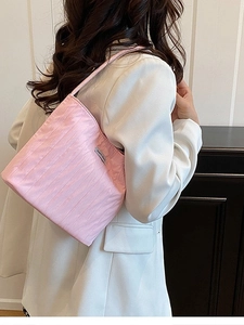 Pink pleated canvas tote bag for women with a minimalist shoulder strap design