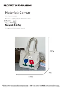 Size chart showing canvas tote dimensions 33x32x13cm with floral embroidery detail