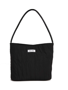 Black pleated canvas tote bag with a long shoulder strap and Ann's then label