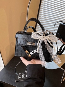 Elegant black crocodile texture Kelly bag with lace pearl bow and gold metal clasp