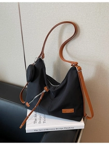 Black large capacity hobo tote bag with brown straps and detachable round coin purse