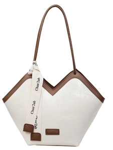 Contrast white and brown textured leather shoulder bag with floral scarf and V-cut design