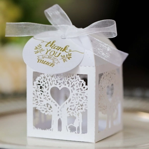 Laser cut wedding favor box with love tree design, white ribbon and thank you tag