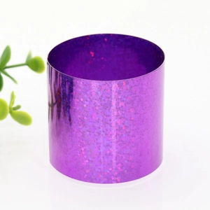 Macro detail of purple laser glitter napkin ring with reflective shimmering texture