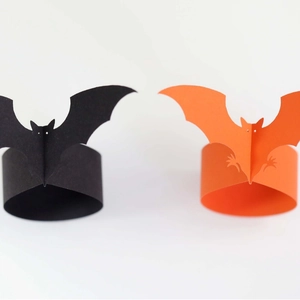 Halloween black and orange bat shaped paper napkin rings with 3D wings for table decor