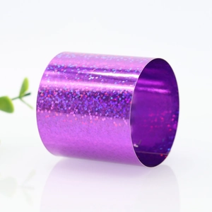 Detail shot of purple holographic napkin ring with shimmering metallic glitter texture