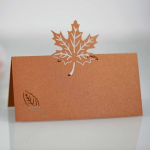 Laser cut maple leaf place cards in bronze pearlescent finish for autumn events