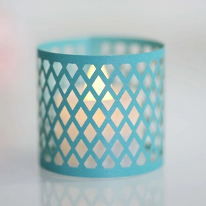 Hollow geometric lattice paper lampshade with warm LED candle light in Tiffany blue color