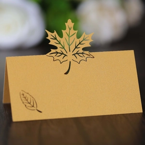 Golden laser-cut maple leaf place card for Thanksgiving table setting decorations