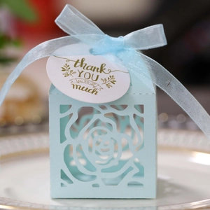Light blue laser cut rose gift box with organza ribbon and Thank You tag for weddings