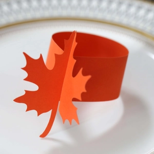 Orange maple leaf paper napkin ring holder for festive Thanksgiving table decoration
