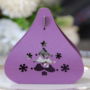 Purple laser-cut Christmas tree candy box with shimmering snowflake hollow design