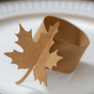 Brown kraft paper maple leaf napkin rings for rustic Thanksgiving table decorations