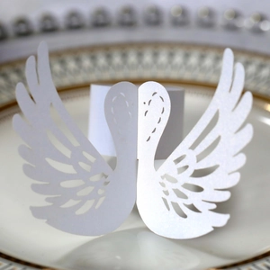 Laser-cut swan design white pearl paper napkin ring and place card for wedding decor