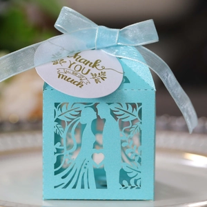 Light blue laser cut wedding candy box with couple silhouette and Thank You tag