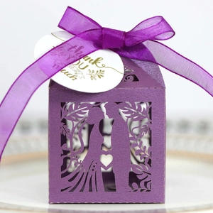 Detailed laser-cut purple wedding favor box with ribbon and Thank You tag