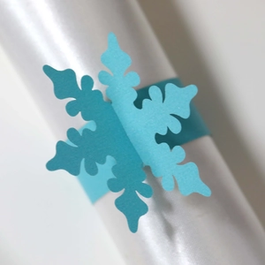 Macro di portatovaglioli a forma di fiocco di neve blu tagliato al laser per feste