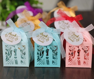 Laser cut wedding favor boxes with bride and groom silhouette and thank you tags