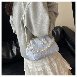 Light blue pleated fabric handbag with butterfly embroidery and pearl chain strap details