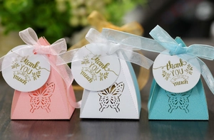 Detailed laser-cut butterfly hollow gift boxes with ribbons for wedding party favors