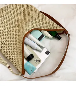 Interior view of large woven tote bag showing spacious capacity for tablet and daily items