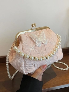 Elegant pink fabric clutch with butterfly embroidery and pearl strap for parties