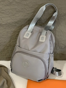 Grauer Nylon-Rucksack und Handtasche mit großem Fassungsvermögen für den täglichen Pendelverkehr