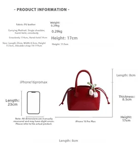 Detailed size specifications for red PU leather handbag with mobile phone comparison